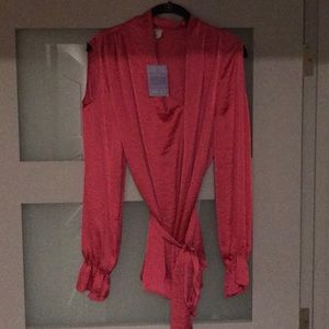 Cold shoulder long sleeve blouse.